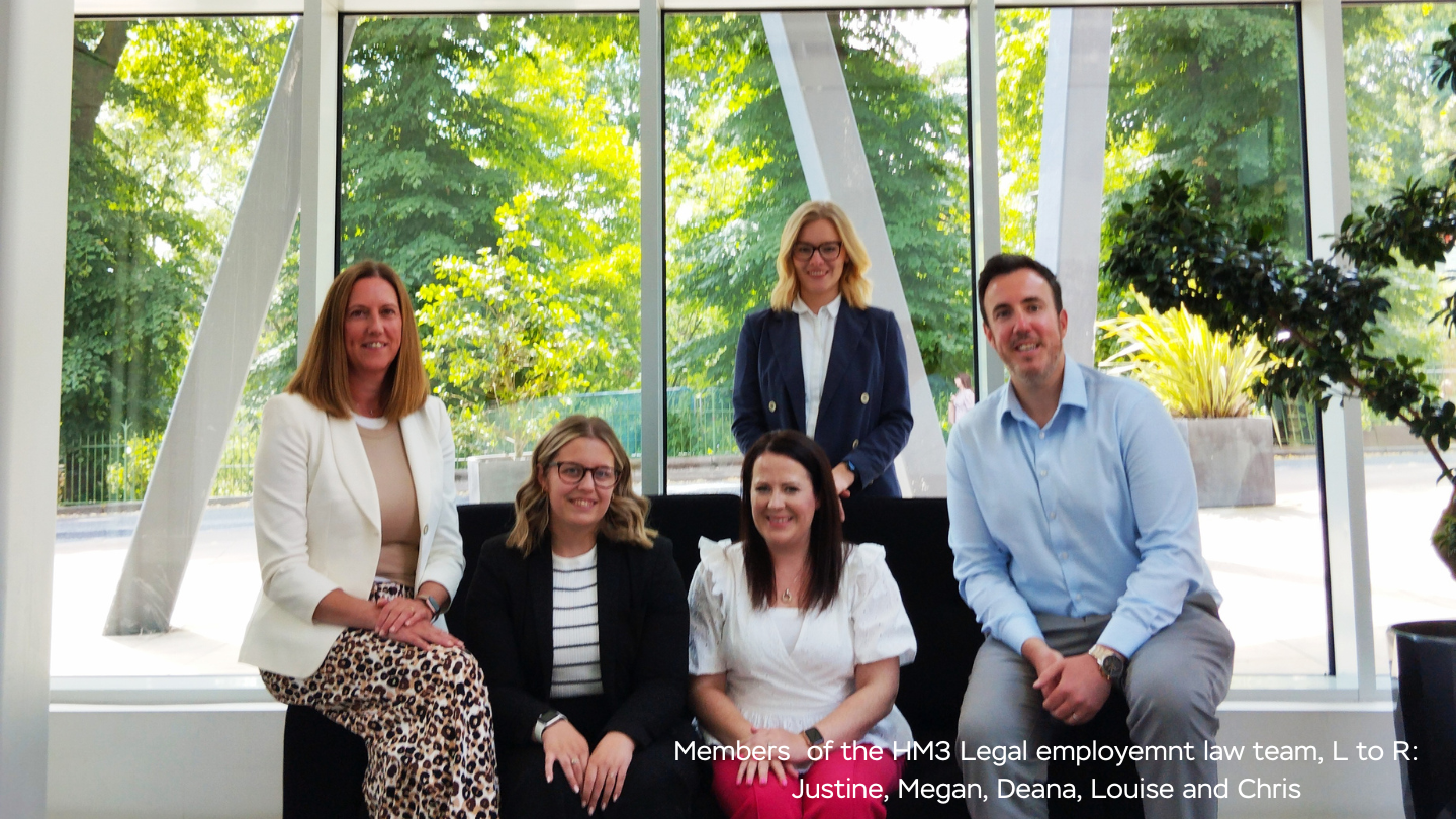 HM Legal team, partners of Bolesworth Estate, posing for a professional group photo in a modern office space.