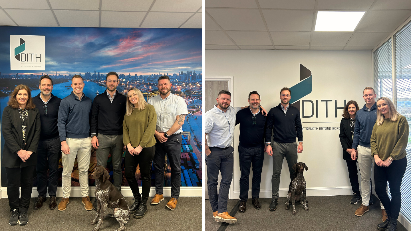 Duferco UK team posing at Chowley Business Park, with a company logo and a friendly office dog.